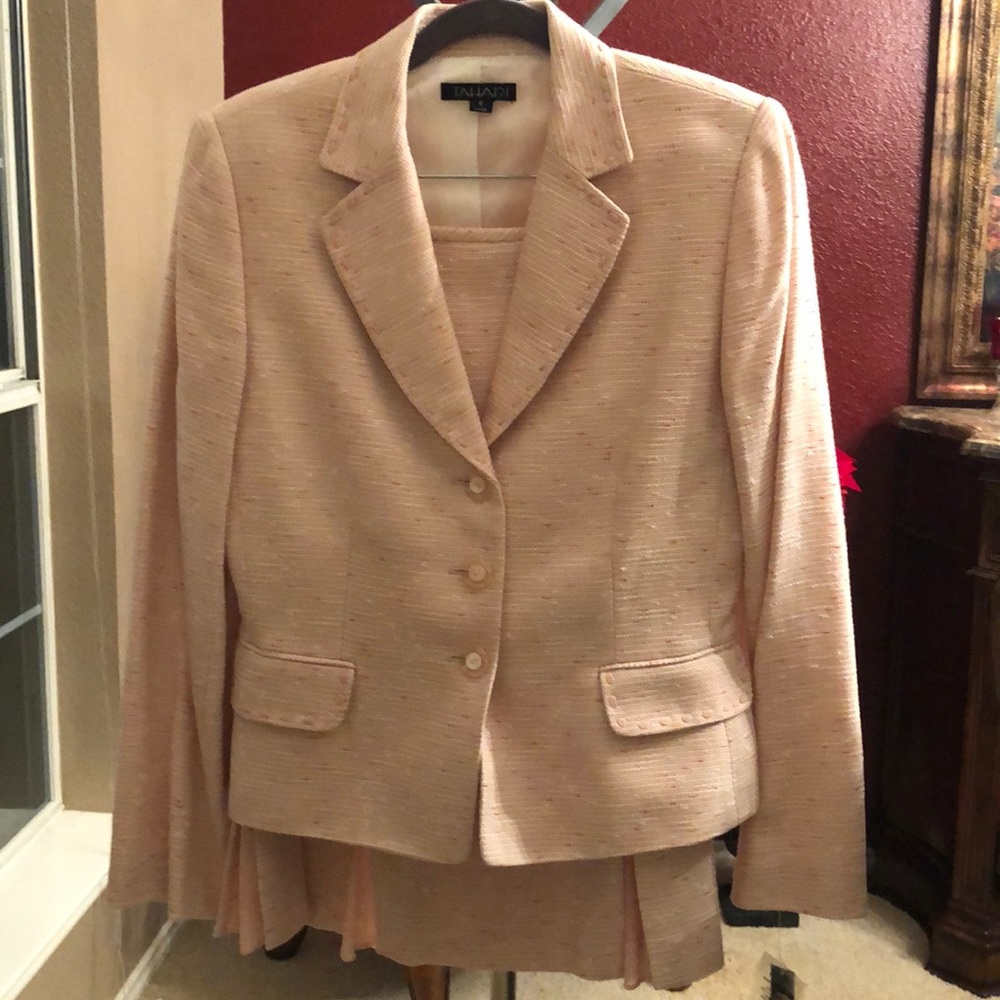 Ladies tweed business suit with detailed stitching